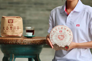 2024 DaYi "Qi Zi Zhi Ge" (The Song of the Seven Sons) Cake 1st Batch 357g Puerh Shou / Shu Cha Ripe Tea