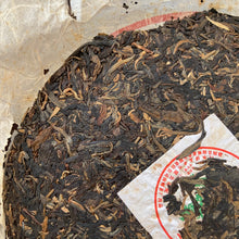 Cargar imagen en el visor de la galería, 2007 NanQiao - BaiShuiQing &quot;Meng Hai - Zao Chun Lao Shu&quot; (Menghai - Early Spring Old Tree ) Cake 357g Puerh Raw Tea Sheng Cha
