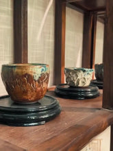 Load image into Gallery viewer, Handcrafted ceramic Chinese gongfu tea cups displayed on wooden shelves