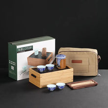 Load image into Gallery viewer, Portable Chinese gongfu tea set with bamboo tray, blue and white cups, carry bag, and tools