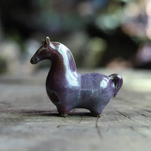 Load image into Gallery viewer, Purple glazed ceramic horse tea pet on rustic wooden surface, Chinese gongfu tea accessory