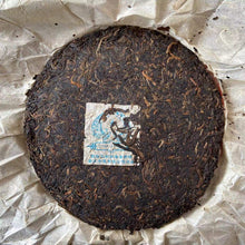 Load image into Gallery viewer, 2005 NanQiao Lan Kong Que (Blue Peacock - 502 Batch) Cake 357g Puerh Sheng Cha R - photo 3