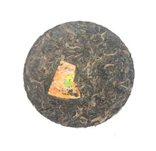 Load image into Gallery viewer, 2009 XiaGuan "Cang Er Yuan Cha" (Cang'er Round Tea) Iron Cake 125g Puerh Sheng Cha Raw Tea - King Tea Mall