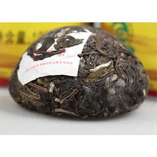 Load image into Gallery viewer, Chinese puerh tea tuocha, compressed dark tea with visible leaves and Chinese label
