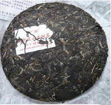 Load image into Gallery viewer, 2010 XiaGuan "Yi Wu Zheng Shan" (Yiwu Right Mountain Green Sun) Cake 357g Puerh Raw Tea Sheng Cha - King Tea Mall