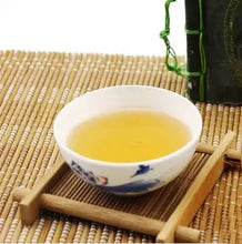 Load image into Gallery viewer, 2011 DaYi "Meng Hai Zhi Chun" (Spring of Menghai ) Cake 357g Puerh Sheng Cha Raw Tea - King Tea Mall