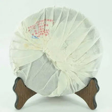 Load image into Gallery viewer, 2011 XiaGuan "Jin Se Yin Xiang" (Golden Image) Cake 357g Puerh Raw Tea Sheng Cha - King Tea Mall