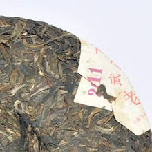 Load image into Gallery viewer, 2011 XiaGuan "Yi Wu Zheng Shan" (Yiwu Right Mountain Old Tree) Cake 357g Puerh Raw Tea Sheng Cha - King Tea Mall