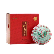 Load image into Gallery viewer, Chinese puerh tea cake and red decorative box with traditional Chinese text and crane logo