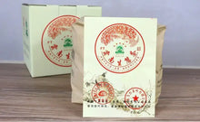 Load image into Gallery viewer, 2013 XiaGuan "FT 5 Xing - Kong Que - Sheng Tai Cha" (FT 5 Stars - Peacock - Organic Tea) 357g Puerh Sheng Cha Raw Tea
