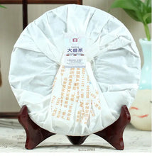 Load image into Gallery viewer, 2015 DaYi "7742" Cake 357g Puerh Sheng Cha Raw Tea - King Tea Mall