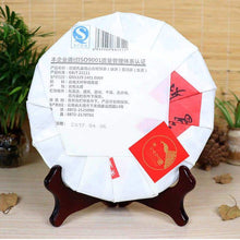 Load image into Gallery viewer, 2017 XiaGuan Zhen Cang Kong Que (Peacock - Naka Old Tree) 357g Cake Puerh Sheng  - photo 4
