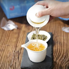 Load image into Gallery viewer, 2022 Xiaguan Da Xue Shan (Big Snow Mountain) 357g Puerh Raw Tea Sheng Cha - photo 4