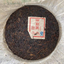 Load image into Gallery viewer, 2006 MengKu RongShi &quot;Da Xue Shan - Ye Sheng Cha&quot; (Big Snow Mountain - Wild Leaf) Cake 400g Puerh Raw Tea Sheng Cha