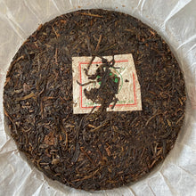 Cargar imagen en el visor de la galería, 2007 NanQiao &quot;Che Fo Nan-Tie Bing&quot; (Iron Cake) Cake 357g Puerh Raw Tea Sheng Cha, Meng Hai