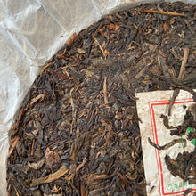 Cargar imagen en el visor de la galería, 2007 NanQiao &quot;Che Fo Nan-Tie Bing&quot; (Iron Cake) Cake 357g Puerh Raw Tea Sheng Cha, Meng Hai