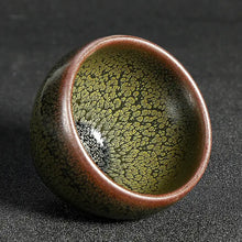Load image into Gallery viewer, Jian Zhan style tea cup with unique golden crackle glaze on black ceramic, for Chinese tea ceremony